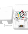 Top Shelf Surface Mount Single Port RJ11 Phone Jack With Four Screw Terminals For Smooth Landline Fax Hookup Hassle Free Install Works Flawlessly On Any Standard White Wall Plate, showing open housing and wiring.