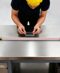 Person adjusting acrylic sheet on a Big 49 Inch Acrylic Heat Bending Machine 1500W Plastic Bender for thermoforming projects.