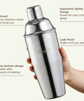 24 Ounce Cocktail Shaker Set With Bar Quality Strainer, Measuring Jigger, Mixing Spoon And Easy Recipe Guide For Beginners, Pro Grade Home Bar Kit In Silver, stainless steel shaker in hand