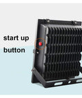Close-up of Super Bright Solar Led Flood Light with start up button and metal mount, ideal for outdoor security usage.