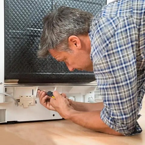 Man using Top Notch T20 Security Torx Screwdriver With Strong Magnetic Tip Heavy Duty Drop Forged Steel for appliance repair.