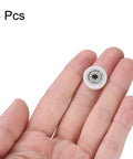 8 Pack Heavy Duty Nylon Ball Bearings 3X15X4mm Mini Roller Idler Guide Pulley With ABEC 1 Precision Rating shown in hand