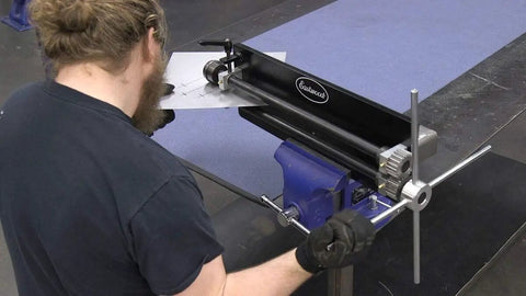 Person using Set Screw Bead Roller Attachment With Four Arms For 22mm Shafts Aluminum Block 8 Inch Spokes Easy Install Replaces Your One Arm Crank Fits Bead Roller Model 28187 Heavy Duty Shop Tool