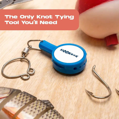 Knot Tying Tool For Safe Tackle With Hook Guard Cover And Built In Line Cutter, blue multifunction fishing accessory on table.