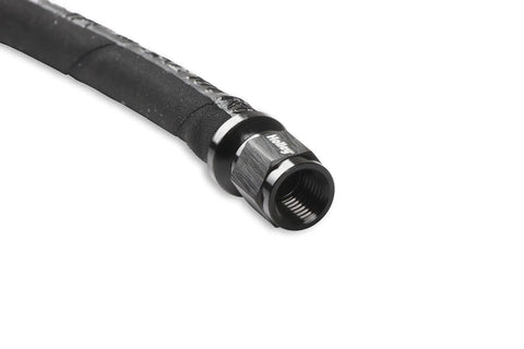 Close-up of black hose from LS Steam Tube Kit For Performance Engines With Adjustable Pivoting Vent Adapters