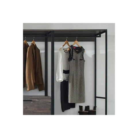 Top Shelf Wood Walk In Closet Organizer System Featuring Straight Up Customizable Shelves Heavy Duty Hanging Rods And Hassle Free Drawers For Bedroom Storage That Honestly Maximizes Space, showcasing hanging clothes on a metal rod.