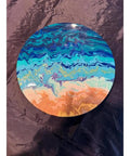 15-Inch Hand Painted Lazy Susan That Spins 360 Degrees For Dining Tables And Kitchen Counters, A Wood Centerpiece Tray With Bar-Grade Resin Finish, Perfect Coffee Bar Decor And Everyday Tabletop Vibes with vibrant blue and orange swirl design on black surface background
