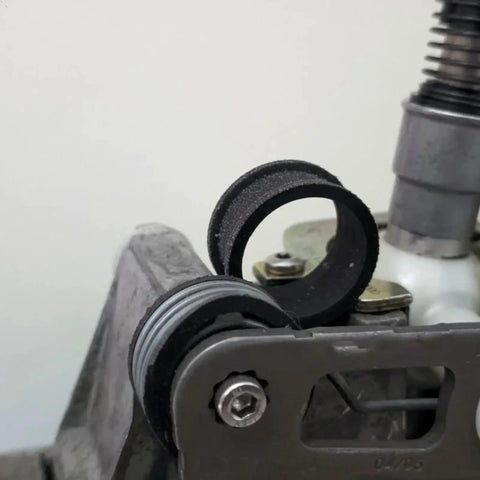 Close-up of Seat Ibiza 6J 2002 2007 and Leon 1M 2000 2005 gear shift cable linkage end bushing repair kit replacement.