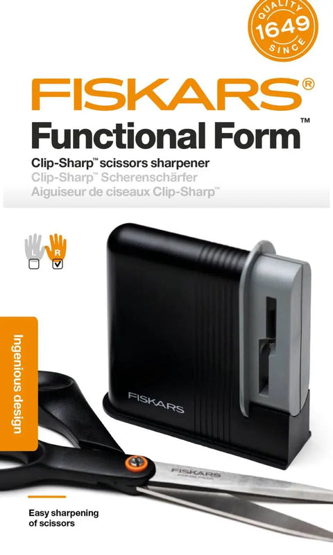 Clip Sharp Scissors Sharpener For All Scissors, Quick No Fuss Sharpening, durable plastic body and easy care material shown with scissors