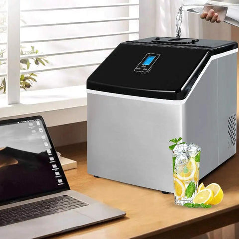 Compact Countertop Ice Maker Cranks Out 24 Frosty Cubes In Under 20 Minutes With A 2.2L Quick Pour Tank and lemonade.