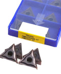 Top Tier Indexable Carbide Lathe Tool TNMG220408 EF YBG205 packaged with sharp triangular inserts for stainless steel machining.