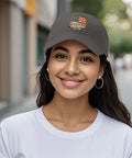 Woman wearing Women Adjustable Cap In Dark Grey, one size fits most, with USA flag design, outdoors
