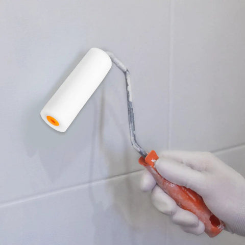 10 Pack Small Paint Roller Covers And Heavy Duty Sponge Rollers Bring Smooth As Silk Wall Finishes With Zero Drips And Even Application Ideal For Quick Home Makeovers And Stress Free Painting in use on a gray wall.
