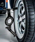 Hella Tight Stance Wheel Fitment Checker Tool For 5 Lug Rims Measures Backspacing And Rim Clearance On 14 To 20 Inch Wheels, mounted on tire.