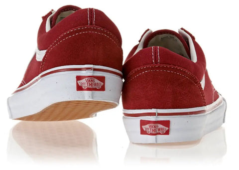 Back view of Vans shoes in red suede with white accents and logo tag, showcasing style and comfort.