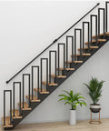 Beefy Black Iron Stair Hand Rail 3Ft Wall Mount Industrial Grade Railing Pipe For Indoor Stairs Outdoor Deck Porch 500 Lb Capacity Non Slip And Rust Resistant Easy Install visible on a staircase.