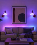 2 Pack Rechargeable Vintage Wooden Wall Sconces RGB Battery Operated Lights illuminating a cozy living room with modern decor.