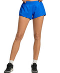 Model wearing Women's Low Rise 2.5 Inch Running Shorts With Built In Liner No Chafe Quick Dry Lightweight Gym Shorts Featuring Breathable Mesh