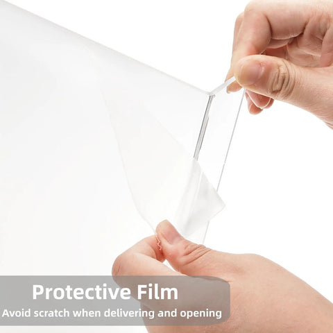 Removing protective film from Two Pack Tilted Keyboard Stand In Clear Acrylic For Ergonomic Typing, showing clear finish