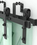 Close-up of double track system for Bypass Sliding Barn Door Hardware Kit, 16 Ft Four Doors, installed on a stud wall.