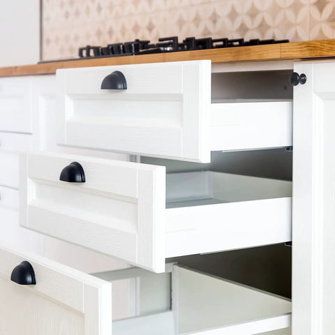 Open white kitchen drawers without 100 Pack Fixing Wedges For Sagging Drawers, 90 Degree Plastic Angle Brackets With Screws, showcasing sagging.