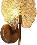 Vintage Leaf Wall Sconce Amber Glass Shade Bronze Iron Wall Light Fixture E26 Bulb Decorative Lighting for Bedroom Living Room Hallway, close-up view.