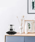 USB Powered Electric Coffee Warmer And Cooler Cup Coaster Legit Dual Temperature Control Base on desk with mug and decor.