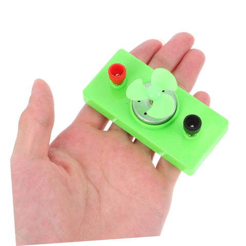 Mini Solar Powered Generator Motor For DIY Science Projects And STEM Kits in hand, used for hands-on learning and creativity.