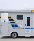 12V Tankless Electric Water Heater With Instant On Demand Hot Water For Campers And Rv Trips mounted on side of an RV.