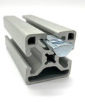 Roll-In T-Nut With Ball Spring 5/16-18, installed in 15 Series Aluminum Extrusion, 13040 Profile, view of fastening mechanism