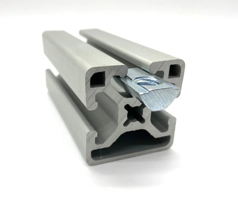 Roll-In T-Nut With Ball Spring 5/16-18, installed in 15 Series Aluminum Extrusion, 13040 Profile, view of fastening mechanism