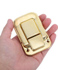 Retro Hasp Latches With Toggle Catch Lock For Antique Wood Boxes Sturdy Metal Closure held in hand, gold steel finish, small size.