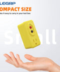 Manual Reset GFCI Outlet Adapter For Indoor Use, 15 Amp Grounded 3-Prong Socket, UL Listed, Yellow, floating over hand