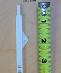 Clearview Shutter Joiner 3.5 inches next to a measuring tape for scale, part of the Quick Fix No Sweat Super Slick Shutter Joiners Repair Kit.