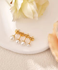 Five Piece Pearl Stud Earrings Set With Gold Finish Ball Studs From 4mm To 8mm For Women And Men, Classic Gold Pearl Earrings For Everyday Wear, Dope For Multiple Piercings And Modern Day Style. Gold pearl stud earrings set on white surface