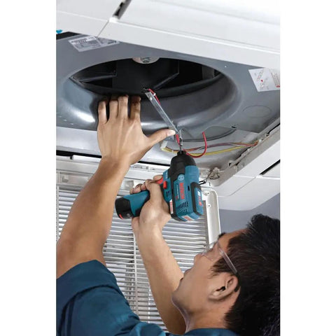 Person using Lightweight 12V Max Brushless Impact Driver Bare Tool With Ultra Compact 5.4 Inch Head in tight space