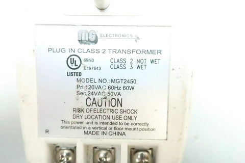 Label on MGT2450 Plug In Transformer 60W 120V AC To 24V AC Power Adapter showing specifications and safety warnings.