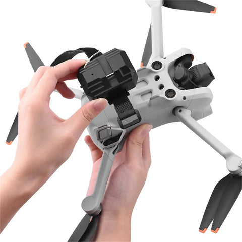 Attaching Drone Payload Dropper Airdrop System to DJI Mini 5 Pro for fishing line delivery and weddings.