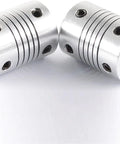 Solid Flexible Shaft Connector Coupler For CNC Motors With 5mm To 8mm Bore Range And 19X25mm Dimensions In Sleek Aluminum Alloy Build Perfect For Light To Medium Duty Jobs Including Encoders Lead Screws And Pumps Without Breaking The Bank. silver aluminum CNC shaft coupler, 19x25mm, 5mm-8mm bore