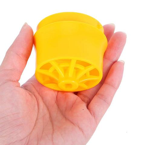 Totority Pvc Threader Kit For Electric Drill To Create Plastic Pipe Threads On 1/2 Inch And 3/4 Inch Pipes with yellow plastic threading component in hand.