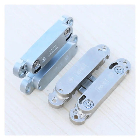 Concealed Cabinet Door Hinge Set For Cupboards, Dope Soft-Close Hardware in silver for kitchen cabinets visible on wooden surface