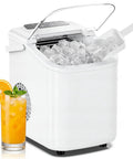 Countertop Ice Maker With Portable Handle And Ice Basket, Delivers Up To 26 Lbs Of Ice Per Day, Produces 9 Bullet Ice Cubes In About 6 To 8 Minutes, Auto Clean Function, Great For Home Kitchen Office Outdoor RV Camping On The Go next to an orange drink with ice cubes.
