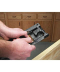 Handy Door Hinge Template Kit With Lock-In Pins and Double Headed Nails in use for precise door hinge alignment.