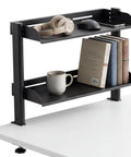 2-Tier Clamp-On Desk Shelf Carbon Steel Space-Saving Desktop Organizer with books and mug, fits desks 0.4-1.77 inches thick, black
