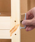Using Allen wrench with Top Shelf Boss Level Flat Head Hex Socket Sheet Metal Screws 100 Piece Set M4 on wooden furniture assembly.