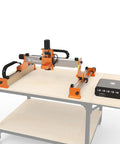 XE-Ultra Core Desktop CNC Router System With 17x17 Inch Active Area on table, featuring NEMA 23 Closed-Loop Steppers and aluminum frame.