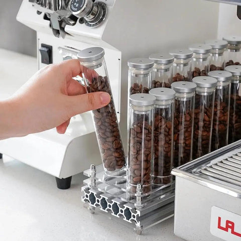 Single Dose Coffee Bean Storage Tubes, Glass And Aluminum Vials, clear tubes with coffee beans on acrylic organizer.