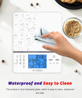 Digital Kitchen Scale With Nutritional Calculator For Meal Prep And Weight Loss, white glass surface being cleaned
