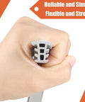 Hand gripping flexible EPDM rubber expansion joint filler, showing texture and flexibility for concrete and driveway cracks.