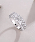 Top Shelf Moissanite Grid Pattern Engagement Ring Platinum Plated 925 Sterling Silver with brilliant round cut stones side view.